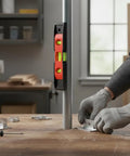 Spirit Level, 3, 30CM measuring a vertical pole with bright vials visible while a gloved hand adjusts a metal bracket.