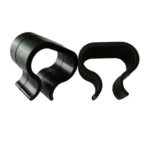 Close-up of two black Outdoor Rattan Furniture Clips for Patio Wicker Sofas and Chairs Alignment Fasteners EVA Connector Set