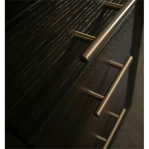 Close-up of metal handles on dovetail drawers of L Shaped Lift Top Standing Desk 56 Inch Wide Hardwood Corner Workstation.