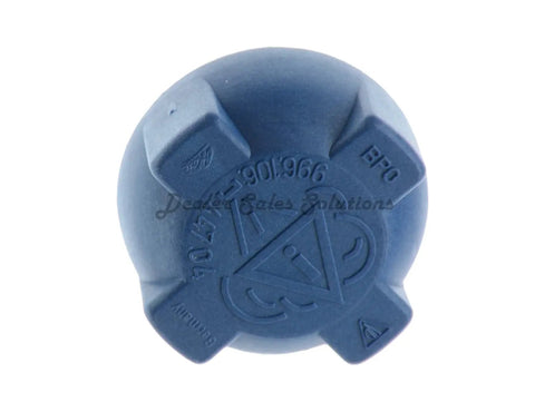 Top view of Porsche Radiator Cap OEM Replacement With Mesh Screen 996 106 447 04 showing logo and part number