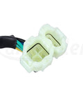 Close-up of a two and four pin connector for GY6 High Performance Racing CDI Box For 50cc To 150cc Chinese Scooters Go Karts ATVs.