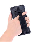 Hand holding the back of the Rugged 6.5 Inch Mini Tablet PC With Windows 11 Iot with a strap, showcasing durability and grip.