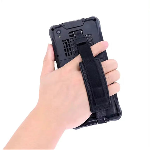 Hand holding the back of the Rugged 6.5 Inch Mini Tablet PC With Windows 11 Iot with a strap, showcasing durability and grip.