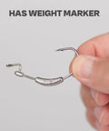 Weighted Swimbait Hooks With Molded Bait Keeper Weedless EWG 1/8 Oz jig head shown close-up with weight marker visible.