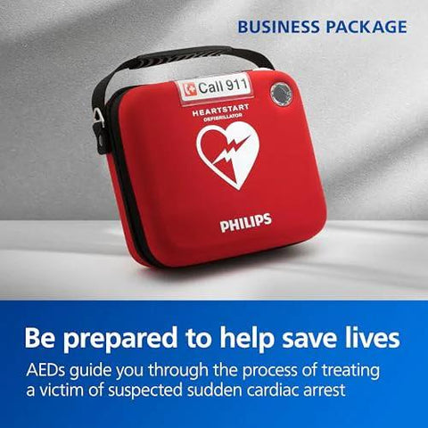 Front view of Philips HeartStart OnSite AED in red portable carry case with heart logo and PHILIPS branding