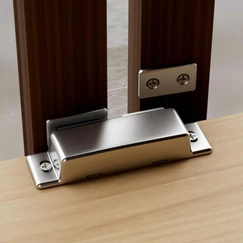 Stainless Steel Cabinet Magnetic Catch Latch For Wardrobe And Cupboard Doors Push To Open installed on a wooden surface