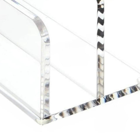 Close-up of acrylic desk file organizer with mail tray corner for home office and studio space saving document storage unit.