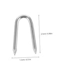 Close-up image of a U-shaped iron staple measuring 2.5cm tall, part of the 50 Pack U Shaped Fence Staples For Quick Install And Strong Hold Durable Metal Garden Stakes For Fences Landscaping And DIY Projects Multi Function Iron Pegs.