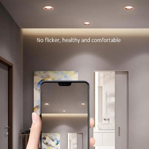 Image of UWYTGF Retrofit Led Recessed Lighting installed in a modern room, showing dimmable baffle trim can lights.