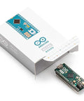IDE Compatible Microcontroller Board With Headers And ATmega32U4 USB Interface next to packaging