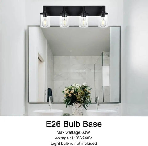 4 Light Vanity Fixture With Crystal Clear Glass Shades In Matte Black Industrial Style For Over Mirror In Bathrooms And Powder Rooms, mounted over bathroom mirror with E26 bulb base.
