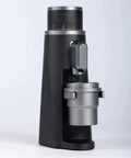 Fire Electric Coffee Grinder With Hella Precise Stepless Adjustment Rock Solid 48Mm Conical Burr For Barista Level Shots side view with silver hopper.
