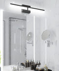 Black 24 Inch LED Vanity Light Fixture Over Mirror Sleek Modern Bath Bar With White 6000K Daylight Glow in bathroom.