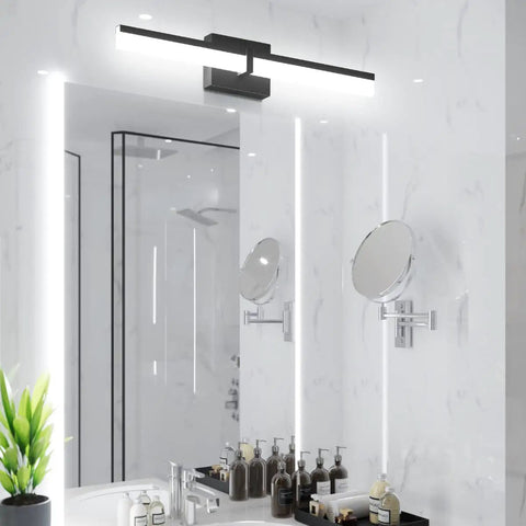 Black 24 Inch LED Vanity Light Fixture Over Mirror Sleek Modern Bath Bar With White 6000K Daylight Glow in bathroom.