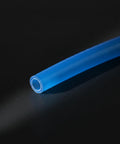 Close-up of a blue polyurethane hose for heavy duty coiled air compressor hose, ideal for pneumatic air line tasks.