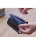 Heavy Duty Black PVC Repair Sealant Tape Waterproofs Leaks And Cracks Instantly For Kitchen Pipes Drains And Bathroom Fixings With Super Sticky Adhesion That Holds Tight Without Dripping Or Peeling Off No Matter How Wet It Gets So You Can Banish Those, being unwrapped.
