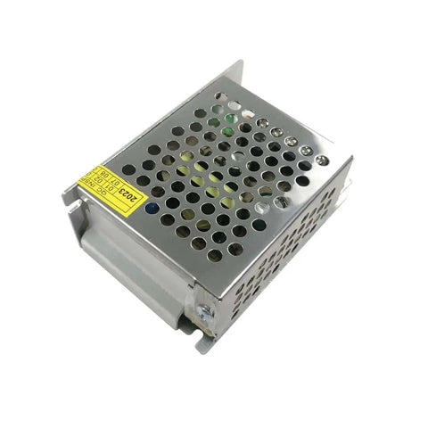 12V 2A DC Transformer Power Supply For 110V To 220V AC Input Converts To Stable 12V DC For Motors And Gadgets Easy Plug And Play Voltage Converter Safe Reliable Power Unit. Compact silver unit with perforated casing.