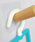 6 Piece Extra Long Wooden Wall Hooks Self Adhesive Coat Rack For Doors Easy Peel Stick showing a white hook and wooden peg.