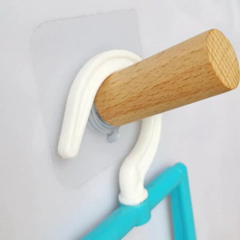 6 Piece Extra Long Wooden Wall Hooks Self Adhesive Coat Rack For Doors Easy Peel Stick showing a white hook and wooden peg.