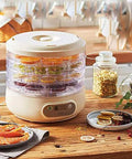Pro Level Electric Food Dehydrator Featuring Hella Slick Digital Controls And Five Spacious Trays For Dishing Out Savory Jerky Juicy Dried Fruits And Crisp Garden Veggies Daily with dried fruits on trays.