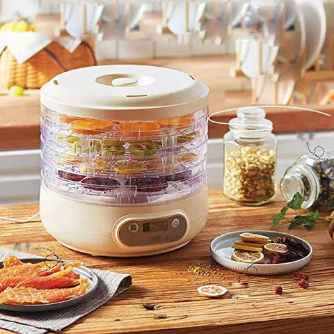 Pro Level Electric Food Dehydrator Featuring Hella Slick Digital Controls And Five Spacious Trays For Dishing Out Savory Jerky Juicy Dried Fruits And Crisp Garden Veggies Daily with dried fruits on trays.