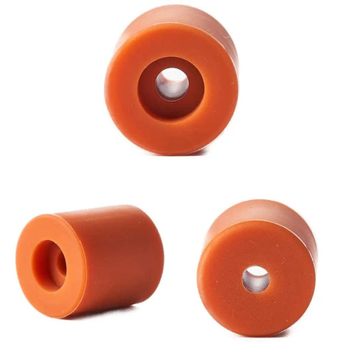 Close-up of orange cylinders from Silicone Bed Mounts And Spacers Kit For 3D Printers Heat Bed Leveling Replacement Parts, 12Pcs With 16mm And 18mm Spacers