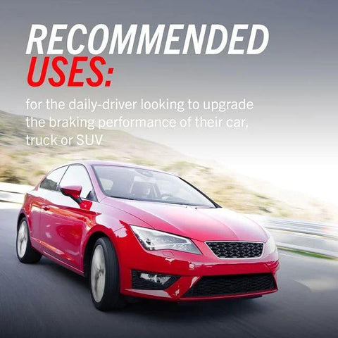 Front-angle view of a red sedan driving on a highway.
