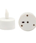 Rechargeable LED Tea Lights Set Of 12 With Flameless Flicker In Amber Color Includes Frosted Holders Charge Base Power Adapter And User Manual For Easy Setup 8 Hour First Charge Consistent 6 To 8 Hour Run Time Safe Home Decor showing a single tea light with switch and screws visible on the base.