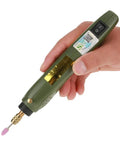 Handheld green Premium Mini Electric Drill And Rotary Tool Kit With Instant Speed Change for precise etching and detail work.