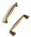 Antique Brass Zinc Alloy Cabinet Pulls With Three And Three Quarter Inch Hole Centers Vintage Style Drawer Handles shown top view.
