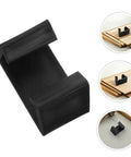 Close-up of black clip from 6 Piece Precision Furniture Clips For Sectional Rattan Chairs And Outdoor Garden Couches
