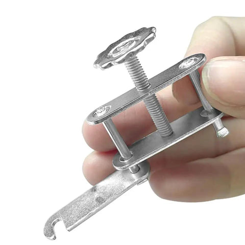 Close-up of Flow Control Pipe Clamps 4 Pack Water Stop Clips for Hoses, showing adjustable swivel screw clamp in hand.