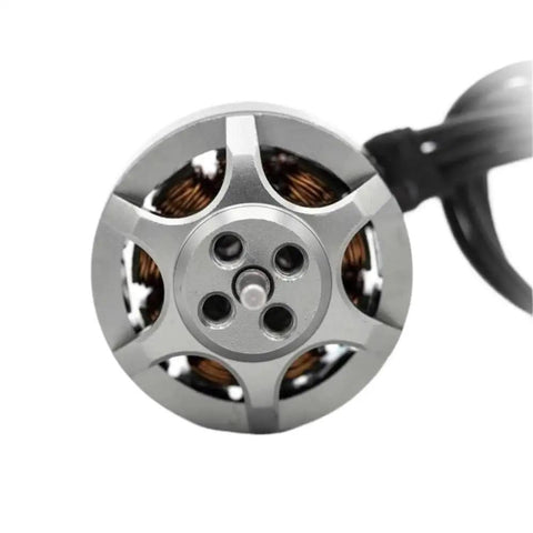 Top view of 1404 Size 2S To 4S 6000KV C-W Brushless Drone Motor For FPV Racing RC Drones showing wiring and casing.