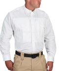 Mens Straight Up Field Ready Tactical Long Sleeve Shirt In Bright White Featuring A Smooth Hidden Zipper Tucked Behind Classic Button Flap For Zero Hassle All Day Grind And Super Light Cotton Polyester Blend worn by model.