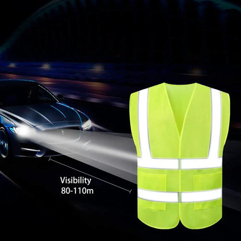 High Visibility Safety Vest 10 Pack Yellow Reflective Vest With 2 Inch Silver Strips next to car headlights for night use