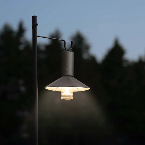 Rechargeable Outdoor Rugged Camping Flashlight Three In One Lantern with 3100mAh Power hanging on a hook outdoors