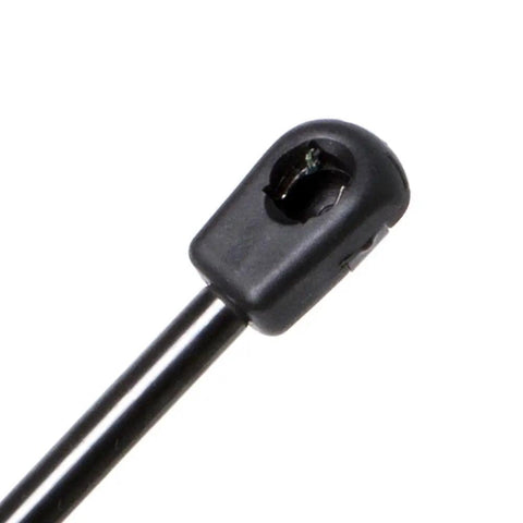 Close-up of heavy duty front hood lift support gas strut for Cadillac Seville 2000 to 2004, features durable black plastic end.