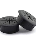 Flexible Desk Cord Grommet Pair Black Wire Organizer Hole Covers for managing PC desktop cables in home office.