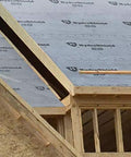 Top Shelf Synthetic Roof Underlayment Boasts Hardcore Fifty Year Waterproof Cover Pre Printed Nailing Lines For Easy Shingle Install Covers Ten Squares Measures Two Hundred Feet Long By Forty Eight Inches Wide Built Damn Tough To Defeat Rainstorms installed on a roof.