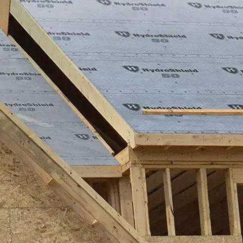 Top Shelf Synthetic Roof Underlayment Boasts Hardcore Fifty Year Waterproof Cover Pre Printed Nailing Lines For Easy Shingle Install Covers Ten Squares Measures Two Hundred Feet Long By Forty Eight Inches Wide Built Damn Tough To Defeat Rainstorms installed on a roof.