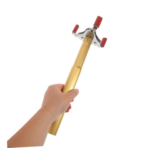 Slick Aluminum Smoke Sensor Removal Tool For Ceilings Universal Fire Alarm Disassembly Grip held in hand with red grips.