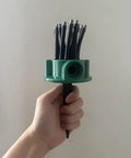 Hand holding Two Pack 360 Degree Garden Automatic Multi Sprinkler System For Lawn And Yard Watering Stake Mounted With 12 Adjustable Nozzles