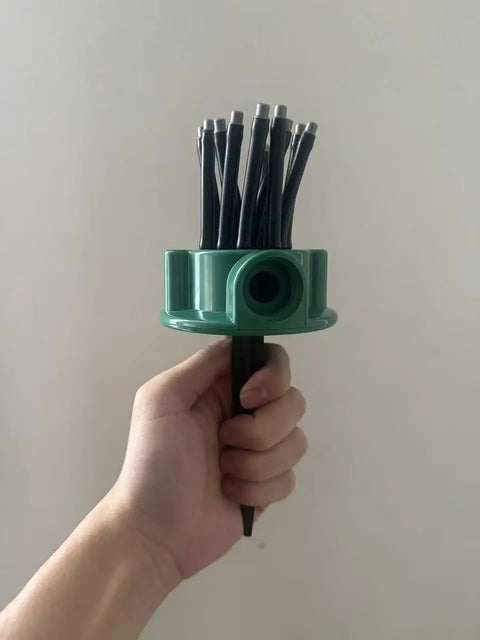 Hand holding Two Pack 360 Degree Garden Automatic Multi Sprinkler System For Lawn And Yard Watering Stake Mounted With 12 Adjustable Nozzles
