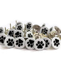 White Paw Print Upholstery Tacks 100 Piece Kit Flat Furniture Decorative Pins With Cute Dog Motifs For Couches Sofas And Wood Projects Big Time Room Refresh, 11mm round decorative tacks with black paw prints.