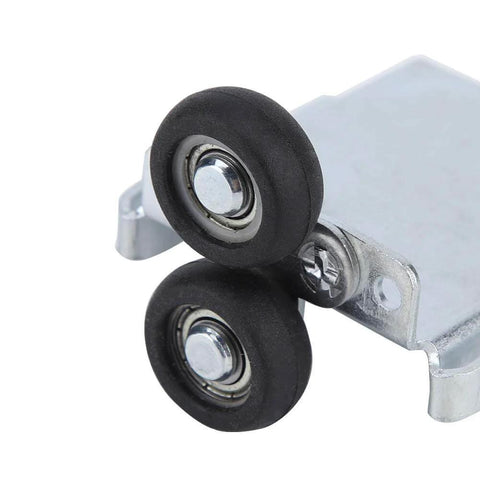 Close-up of a sliding door roller kit for wardrobe and patio doors with solid wheel bearings and steel frame rails DIY friendly top and bottom
