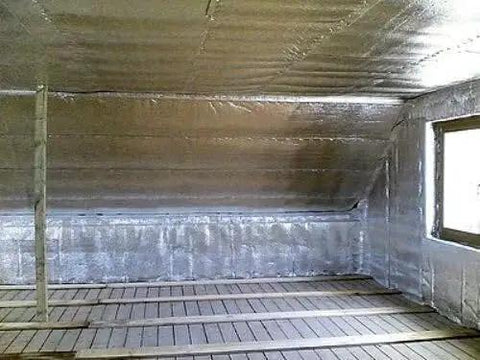Interior view of attic with Heavy Duty Reflective Foil Radiant Barrier Roof Underlayment 4 Ft X 250 Ft 1000 Sq Ft installed.