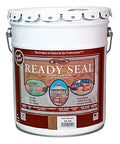 4-Pack Of 5-Gallon Dark Walnut Exterior Wood Stain Sealer Oil Based Semi Transparent For Decks Fences Brings No Drama With Zero Laps Runs Streaks Resists Cracks Peeling Flaking While Beating Moisture Without Sanding Stripping For A Rock Hard Finish in a white bucket.