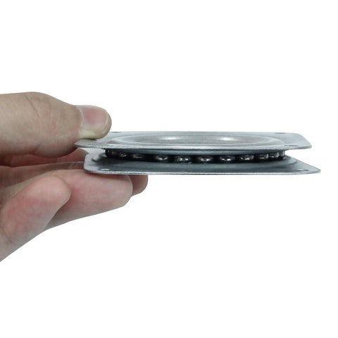 Heavy Duty 2 Pack 3 Inch Lazy Susan Turntable Smooth 360 Ball Bearing Rotation Galvanized Steel Cabinet Organizer held in hand