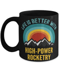 Life Is Better With High Power Rocketry 11 Oz Black Ceramic Coffee Mug with mountain and sunrise design.