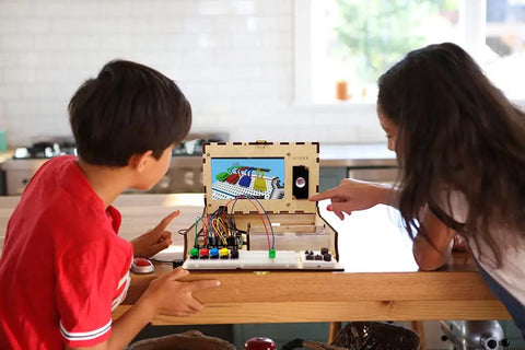 Hands-On Kids Computer Kit For STEAM Learning With Raspberry Pi, Drag-And-Drop Coding, Story Mode, Python Projects, Interactive Games, And Real World Tech Skills on a wooden desk